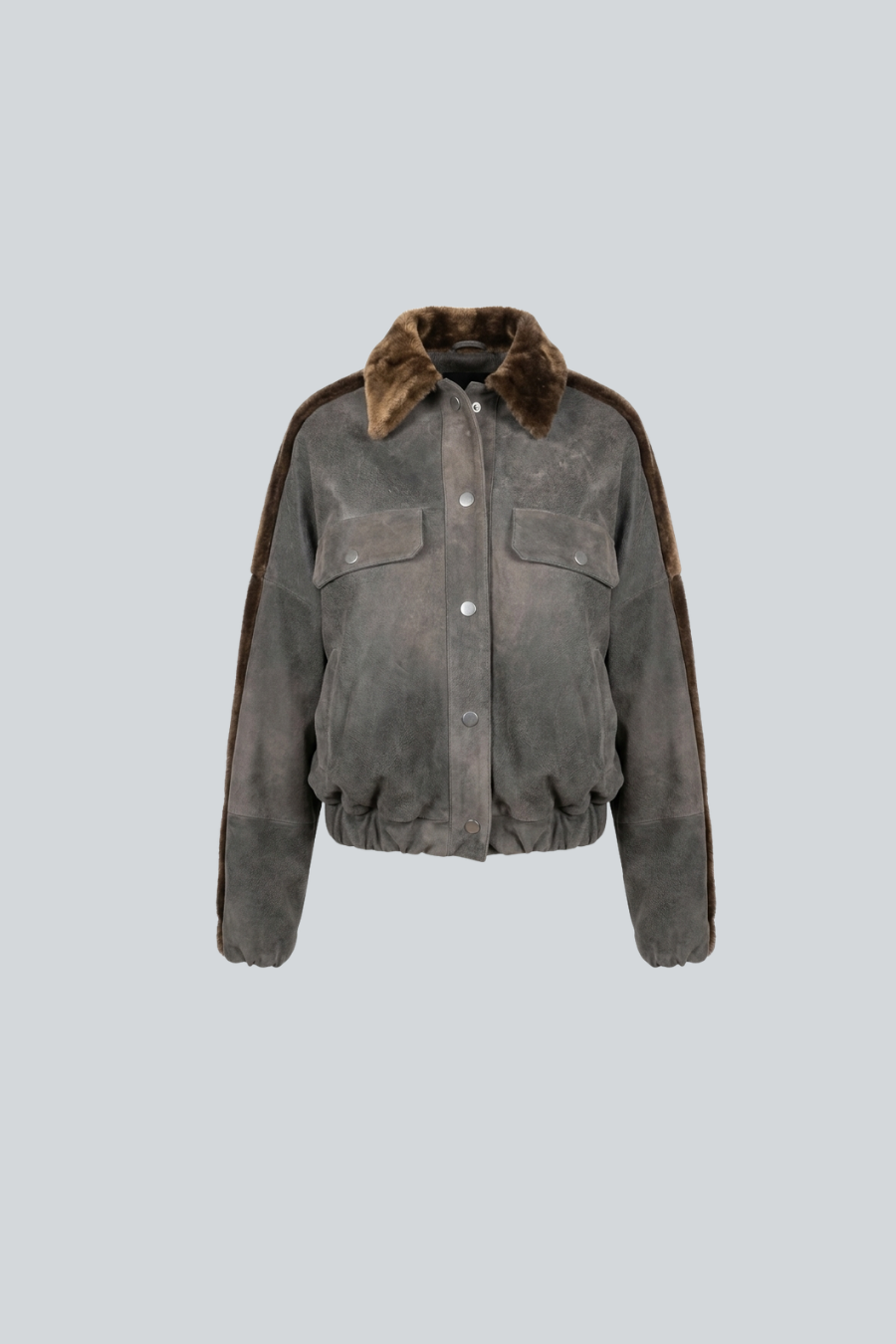 Archivo Bomber de Amkie Gamus, chamarra bomber de piel con acabado desgastado y detalles de shearling