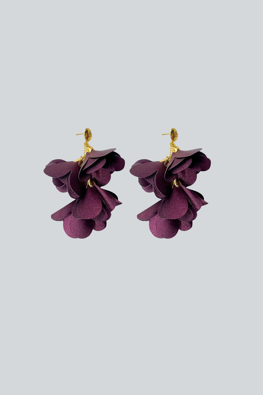 ARETES 4 FLORES BERENJENA