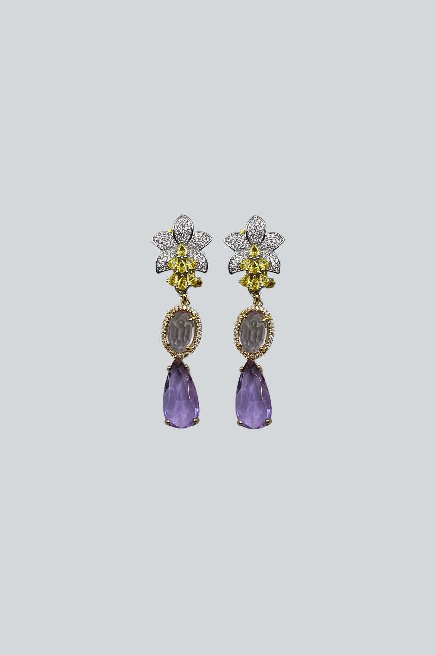 ARETES FLOR PIEDRAS LILA