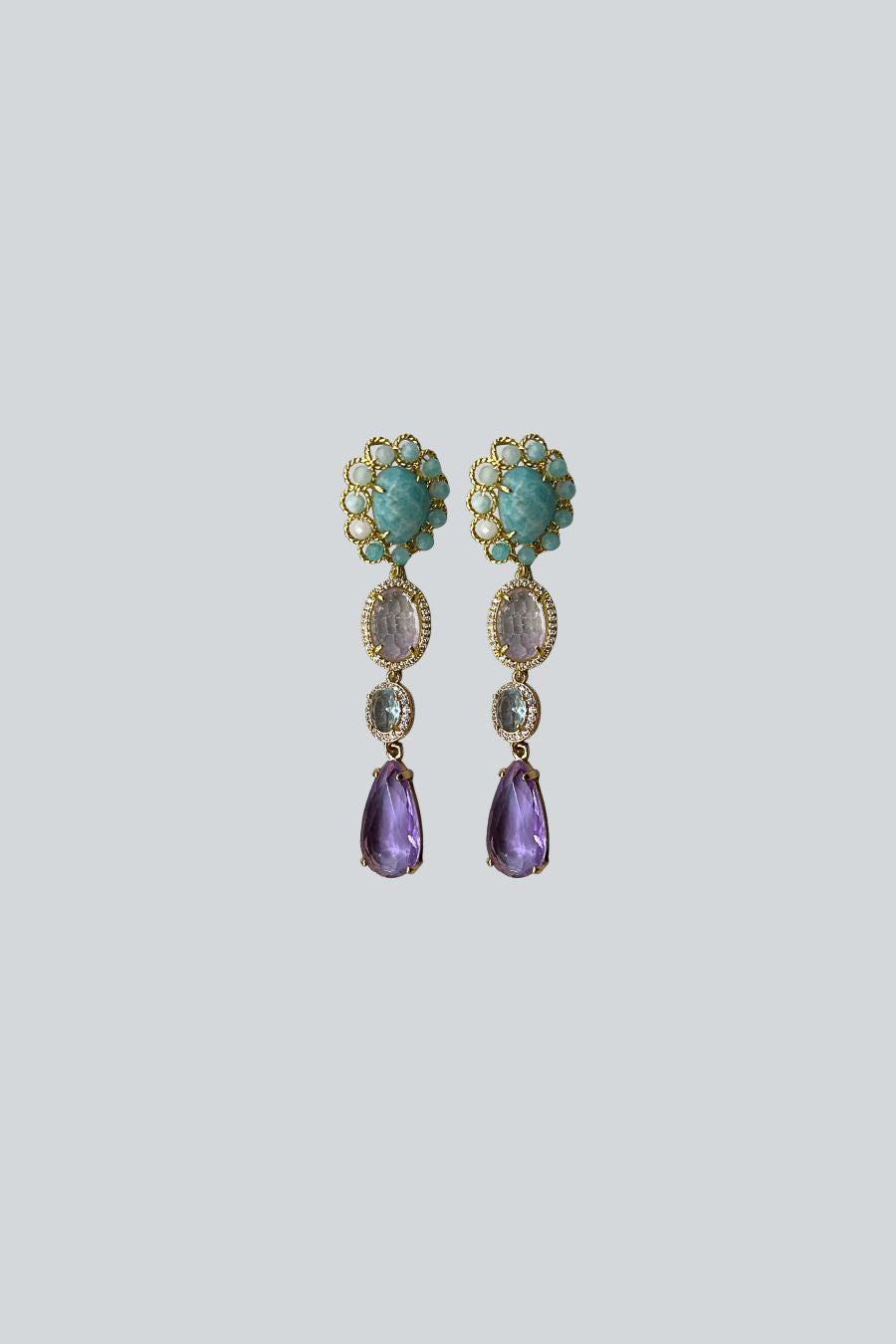 ARETES PIEDRAS AQUA CRISTALES LILA