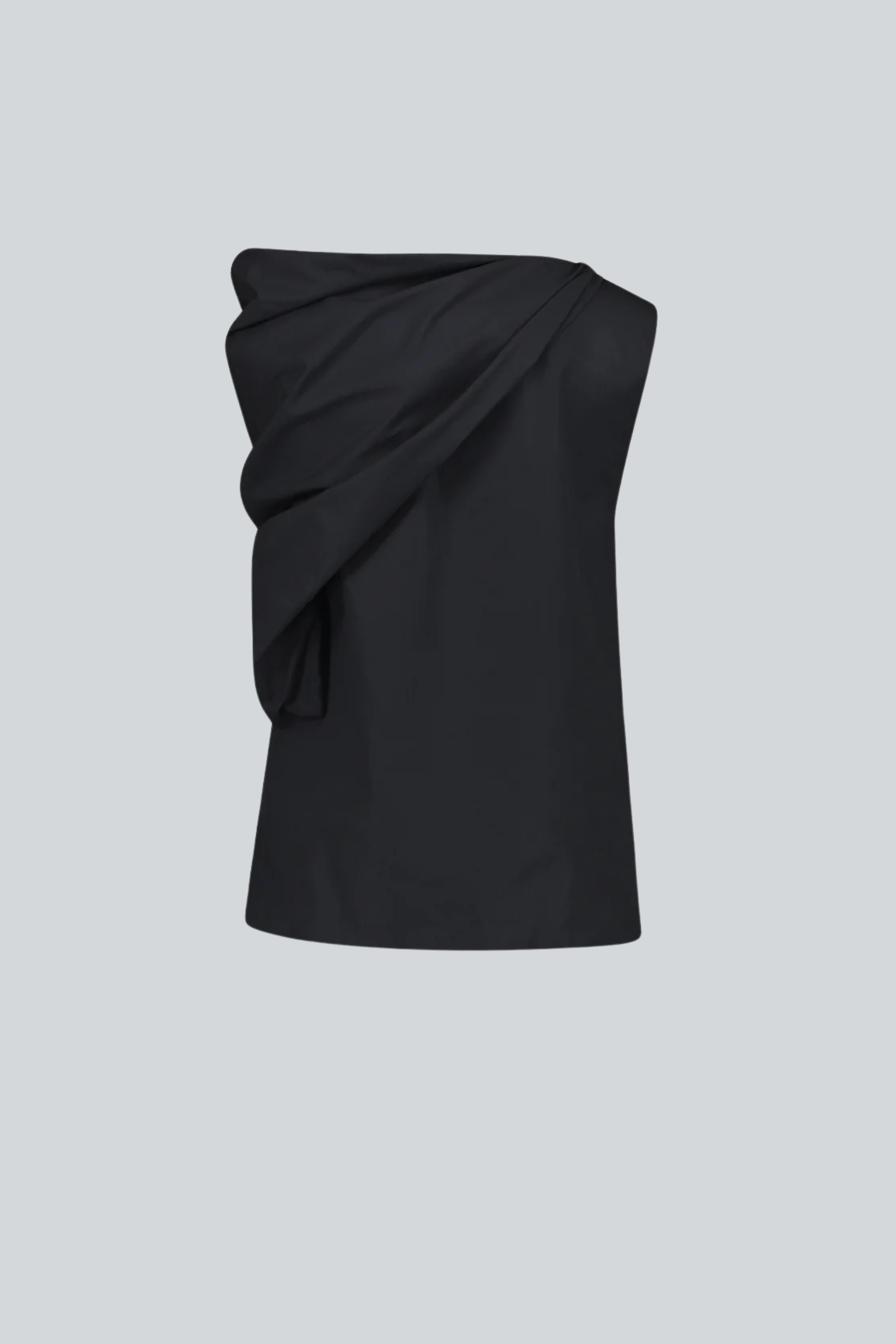 Blusa negra de algodón pima para mujer con diseño fluido de diseñador latinoamericano vista posterior.