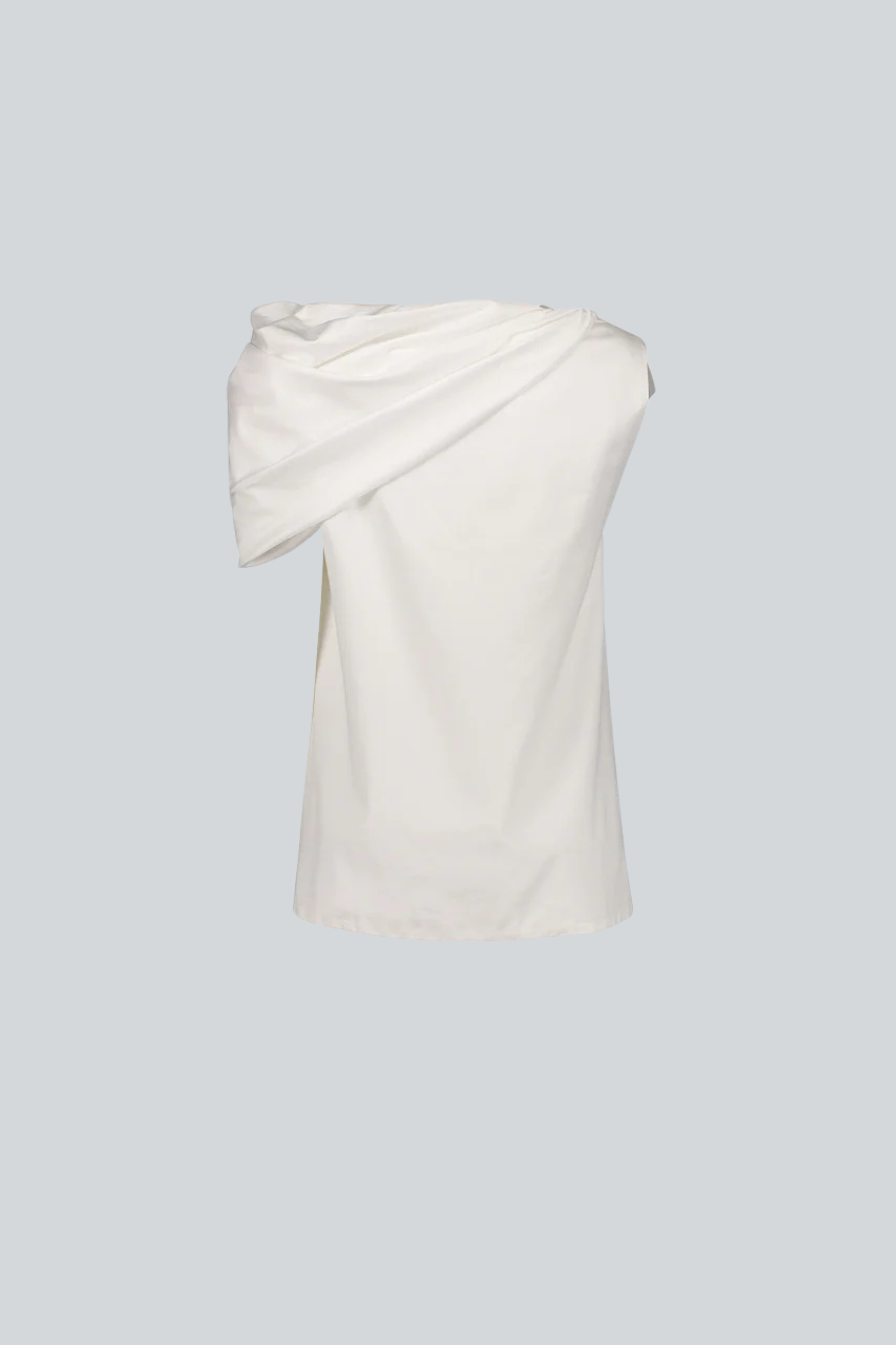 Blusa blanca de algodón pima para mujer con diseño fluido de diseñador latinoamericano vista posterior.