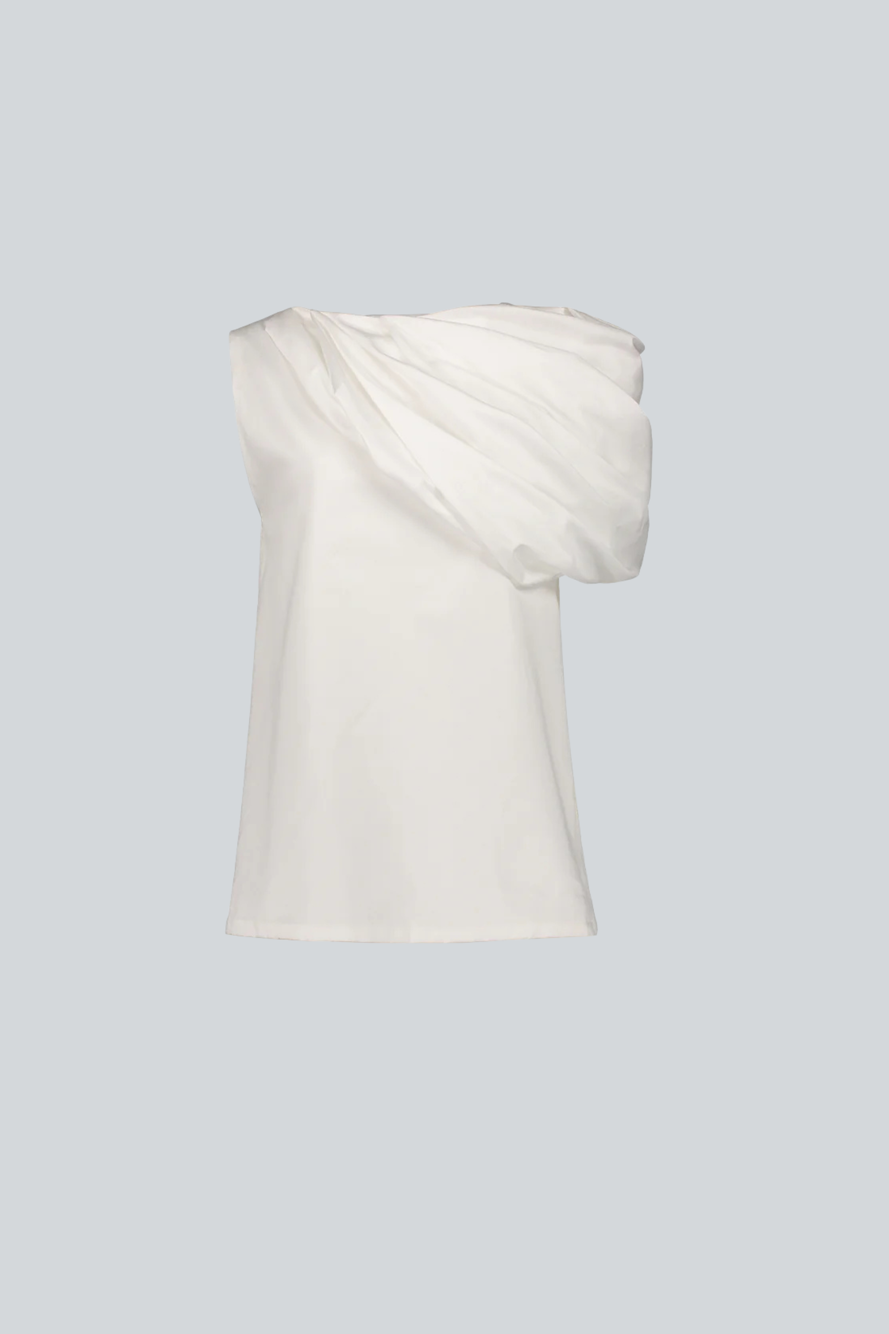 Blusa blanca de algodón pima para mujer con diseño fluido de diseñador latinoamericano