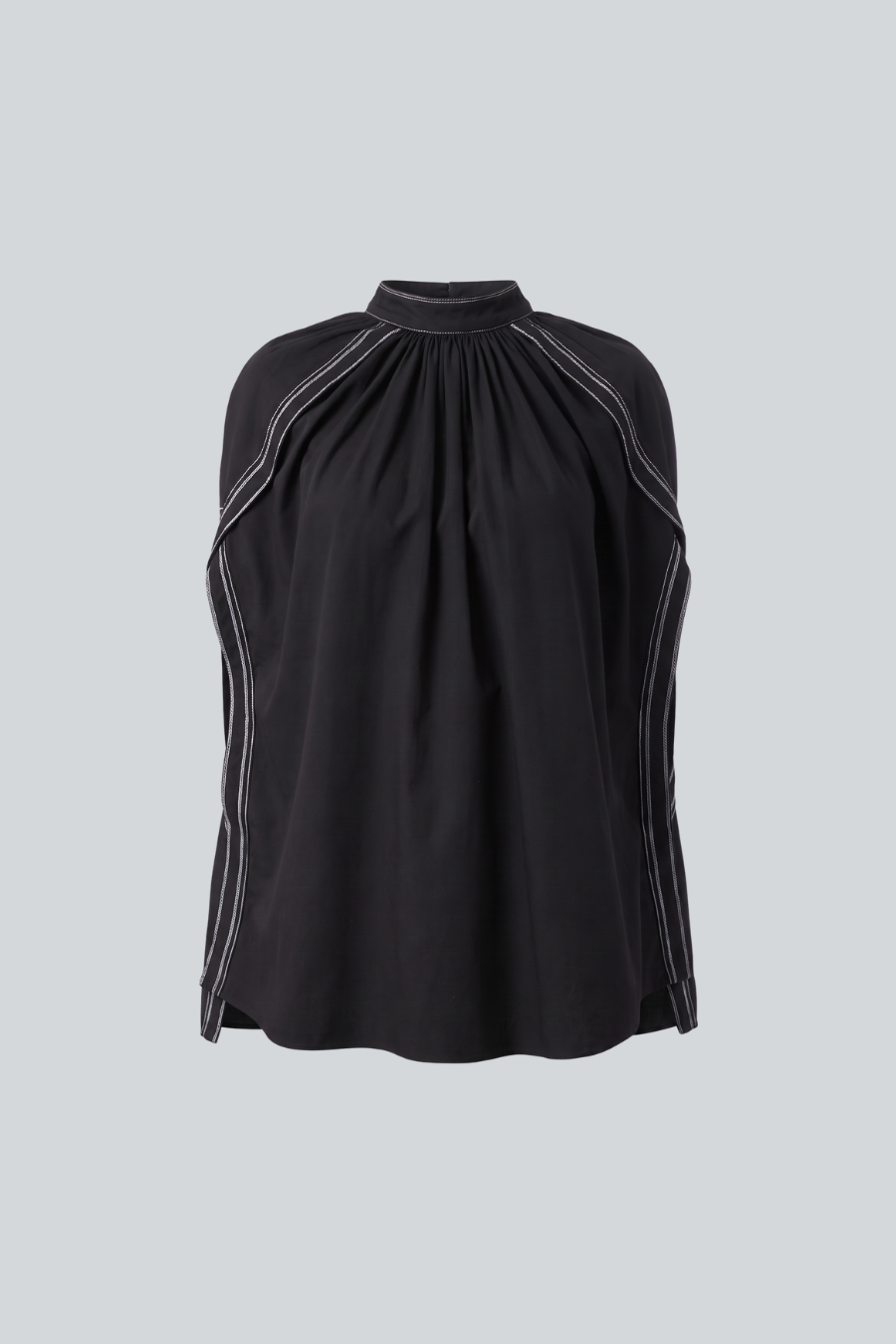 Blusa Anémona de Cancino, blusa holgada de manga corta con cuello y detalles de costuras