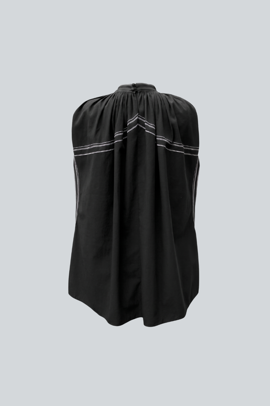 Blusa Anémona de Cancino vista posterior, silueta holgada de manga corta