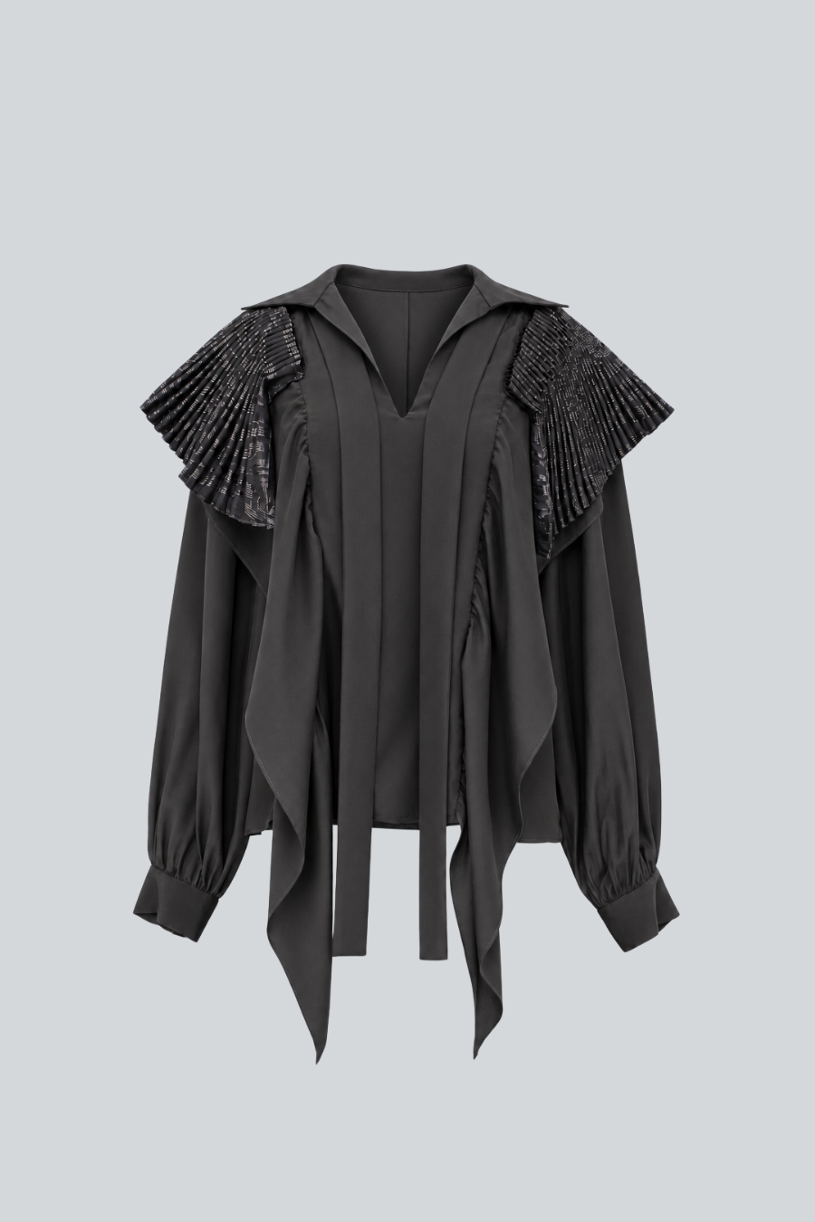 Blusa Chaya de Cancino negra de manga larga con cuello plisado y lazos frontales