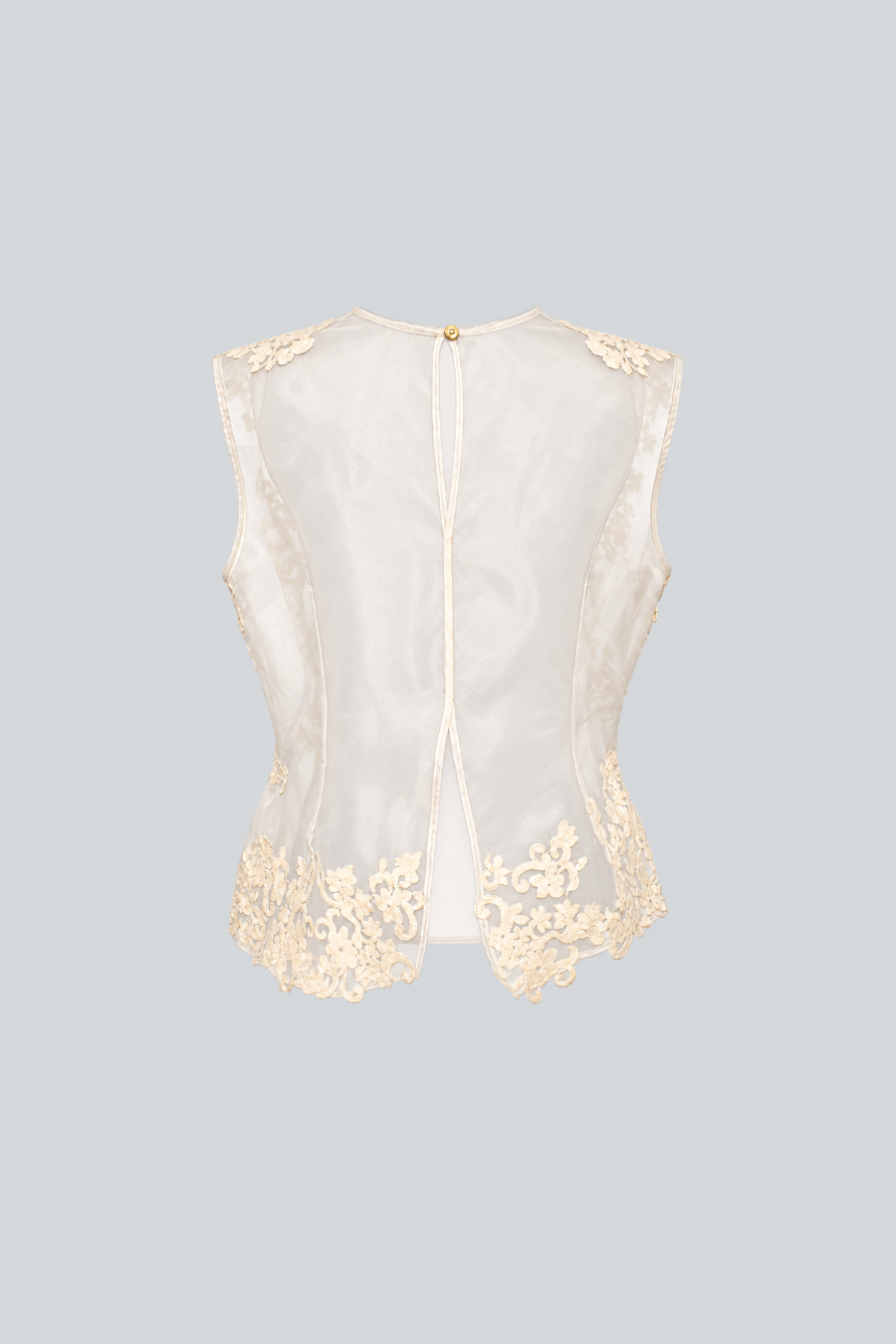 Blusa Devoción translúcida ivory Hilda García vista posterior.