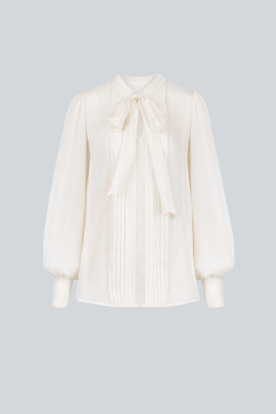 Blusa Gretha de manga larga semitransparente con lazo al cuello
