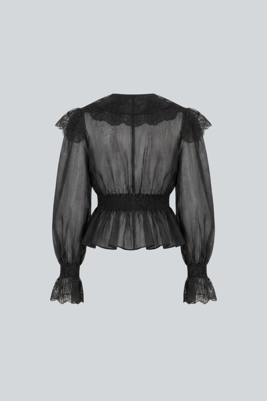 Blusa de manga larga con mangas abullonadas de Vero Díaz, vista posterior.