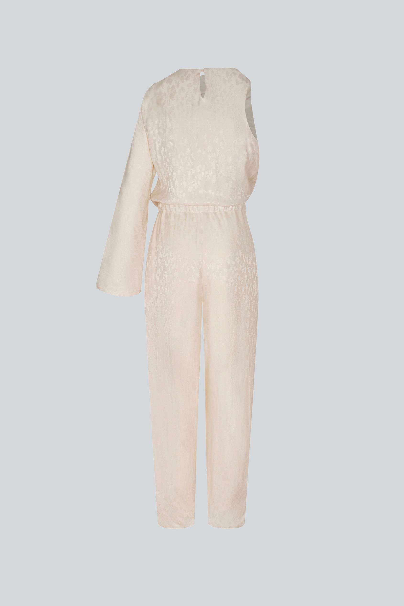 Jumpsuit asimétrico de jacquard color ivory de PADOVA con cinturón, vista lateral.
