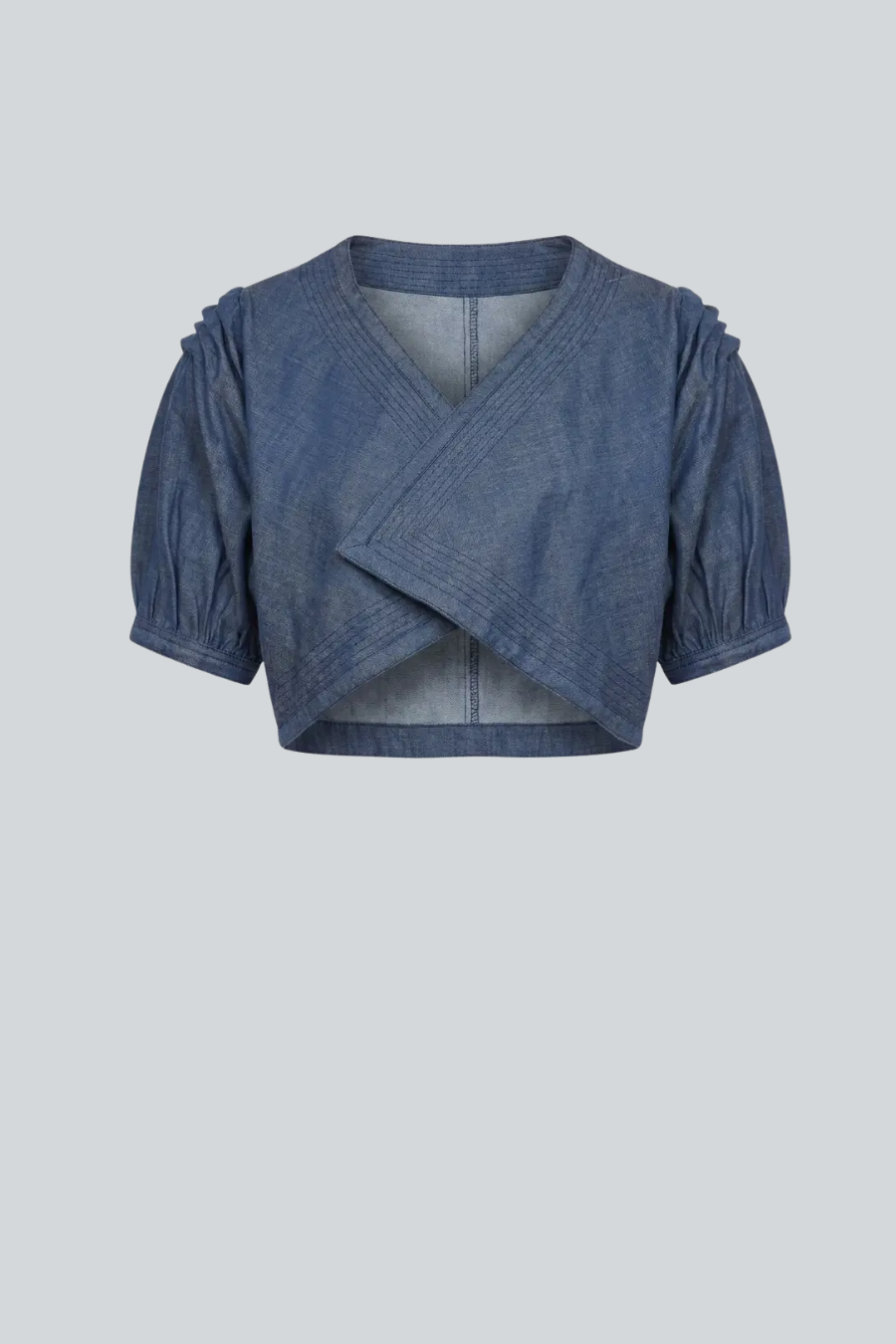 Ensamble Peñasco de denim con mangas globo de Cancino.
