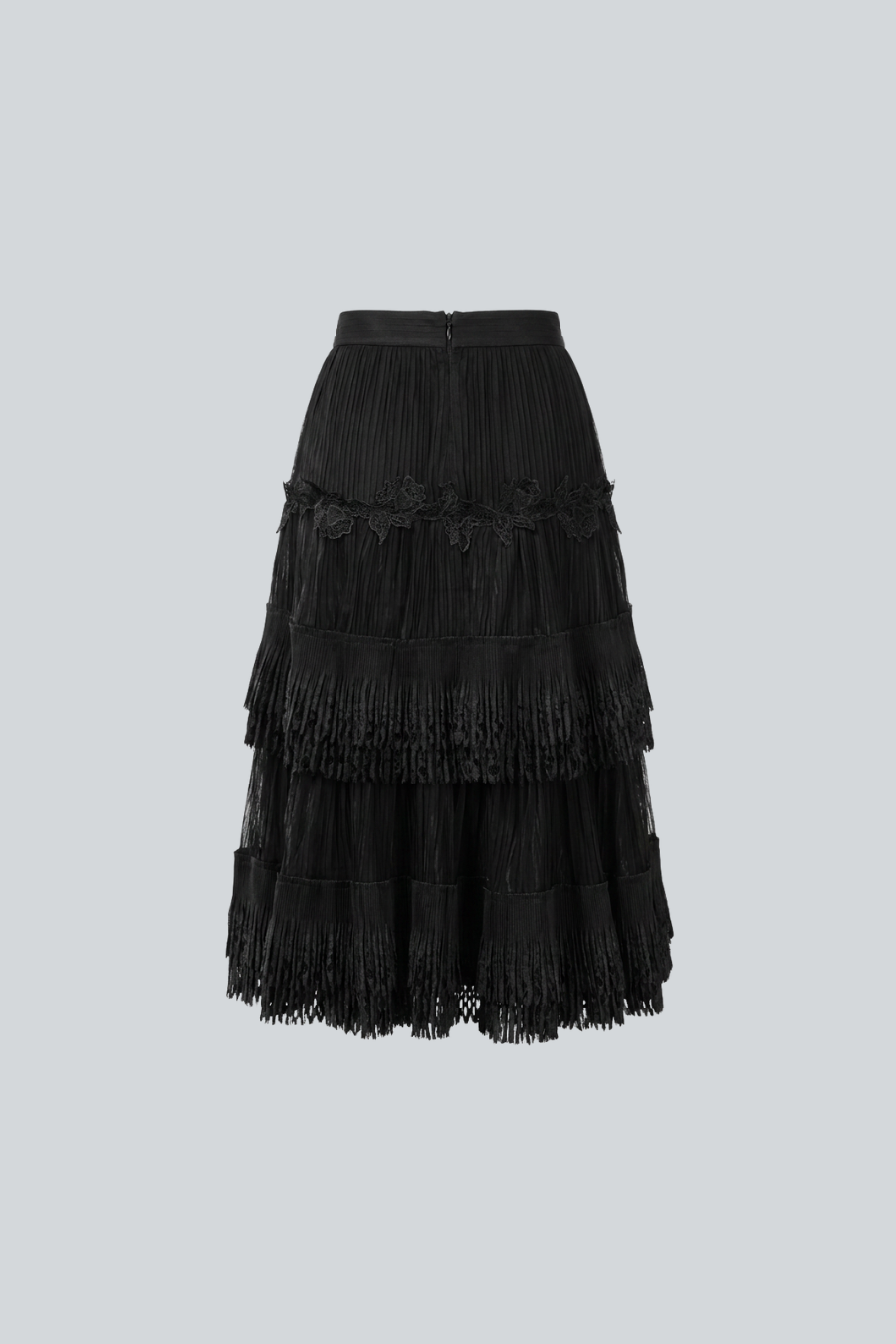 Falda Arabella de Vero Díaz vista posterior, falda midi negra con paneles de guipur