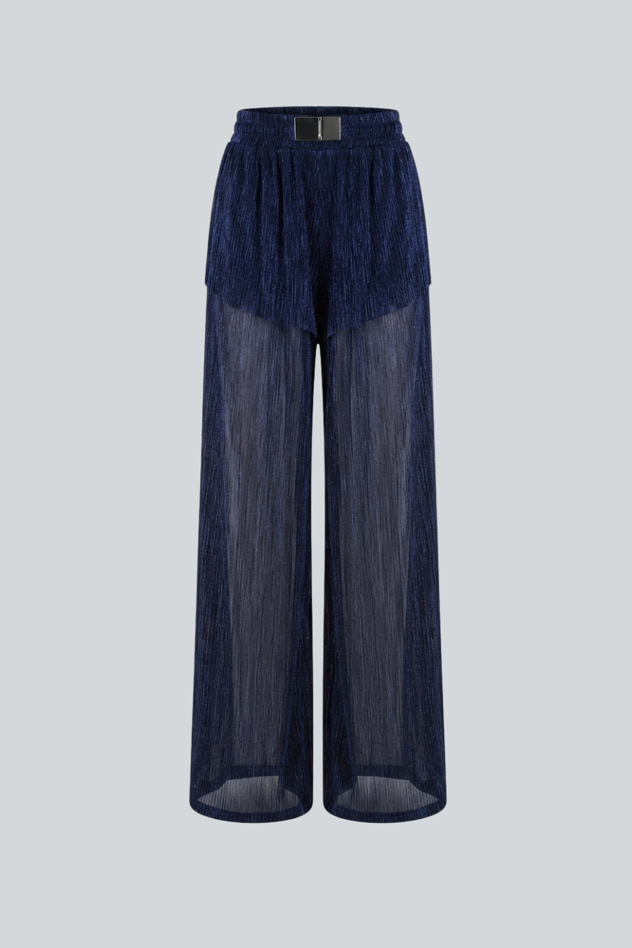 Pantalón holgado de tiro alto con resorte en cintura. Detalle de textura con destellos.