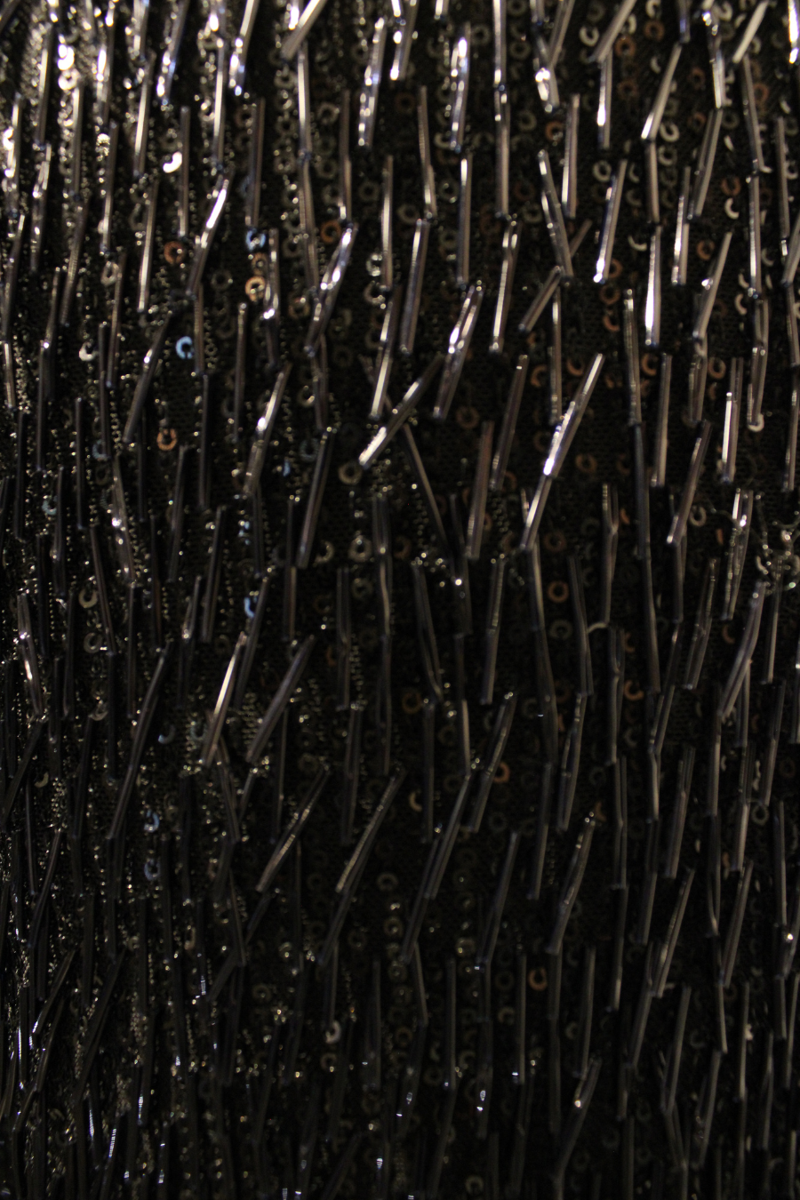 Detalle de Pantalón negro de canutillo de diseño de autor