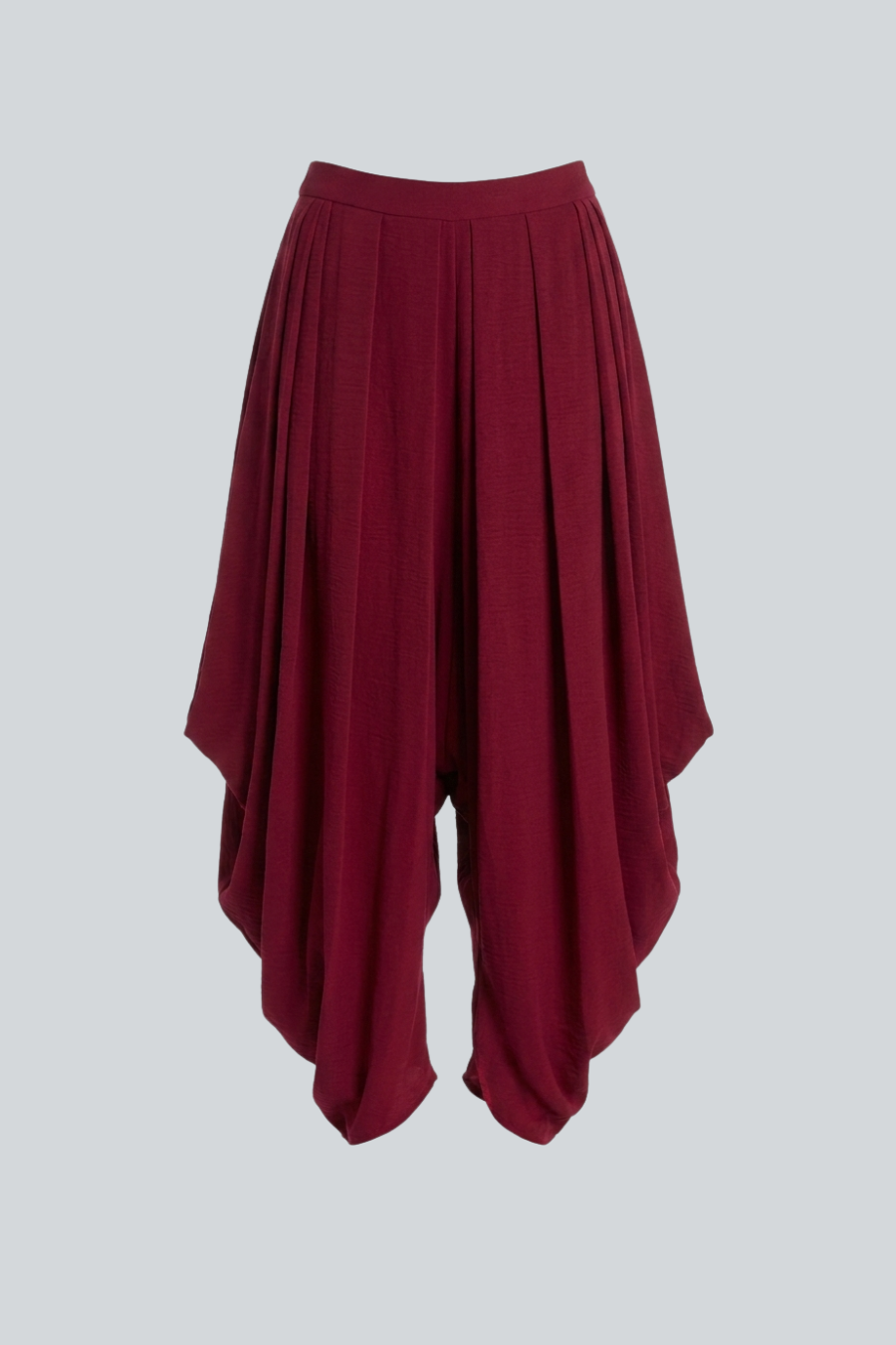 Pantalón Caracola de Cancino, pantalón amplio color tinto con pliegues y silueta estilo bombacho