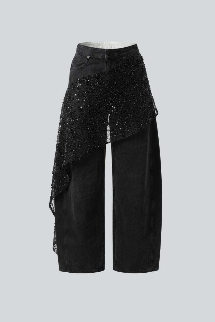 Pantalón Manto balloon negro con pareo asimétrico de Hilda García.