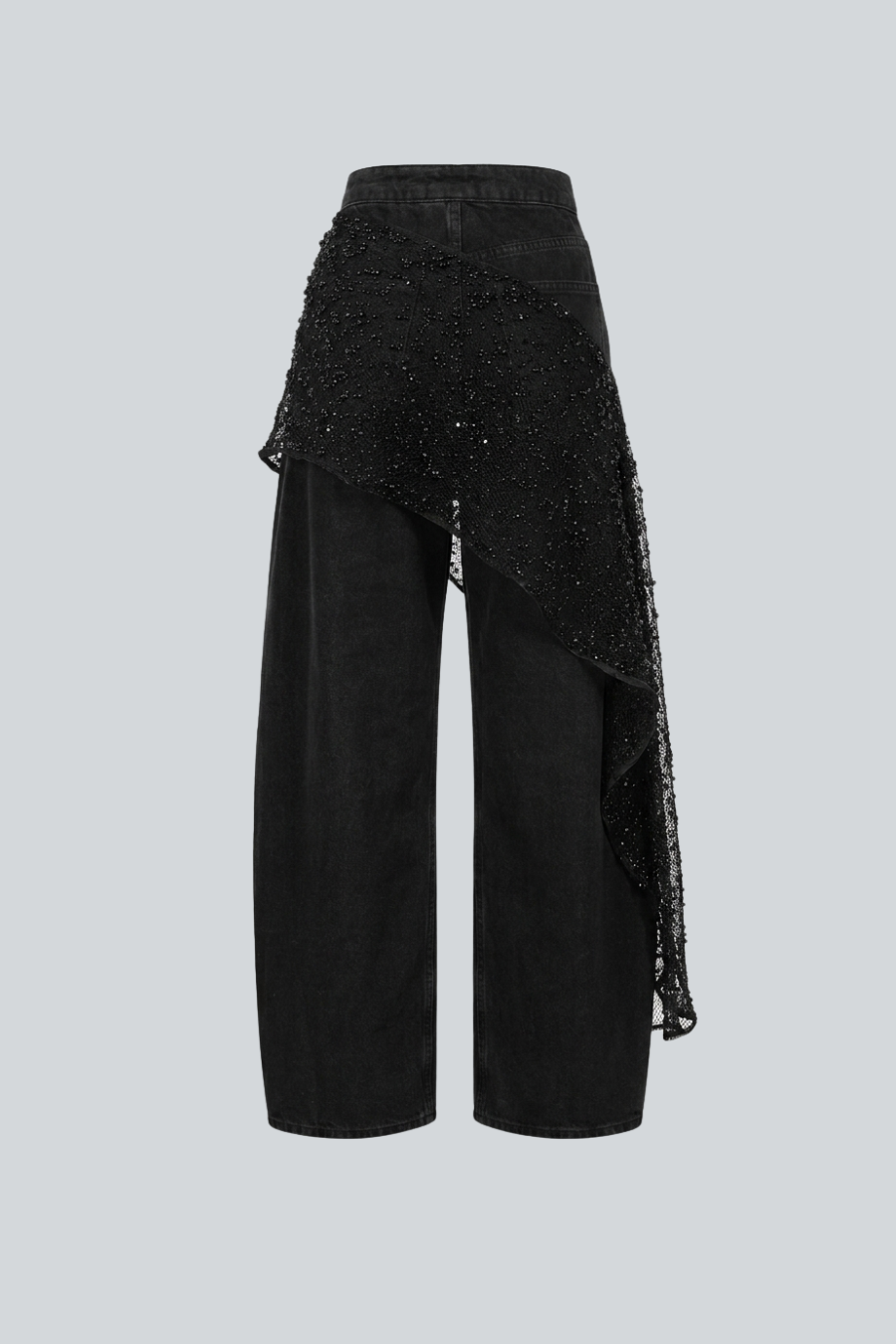 Pantalón de denim negro con pareo de aplicaciones Hilda García.