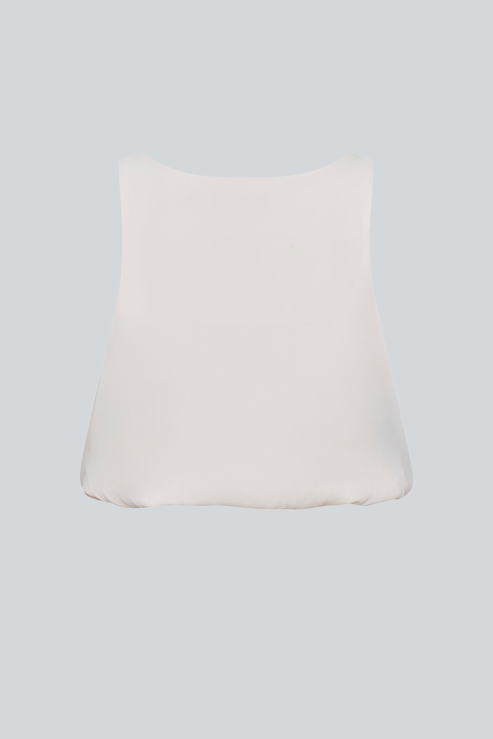 Blusa globo sin mangas color ivory de PADOVA, vista posterior.