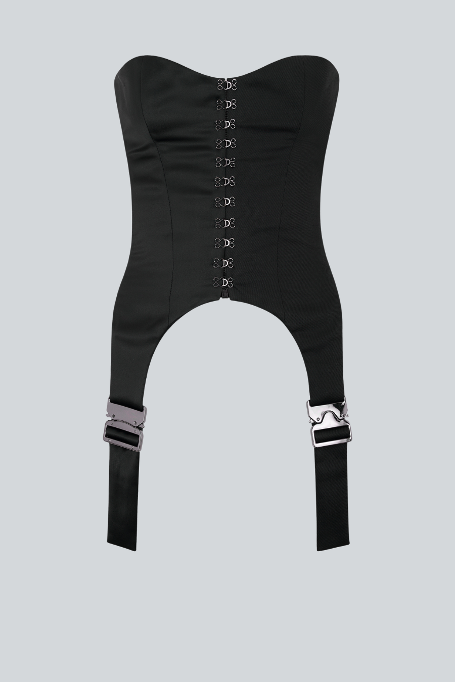 Corset Unattainable Black de Sandra Weil con estructura negra bajo el busto y herrajes metálicos tipo arnés

