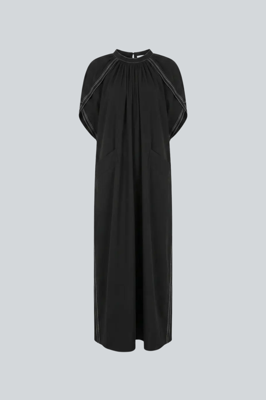 Vestido Comalapa de Cancino, vestido de lino negro con costuras en contraste blanco
