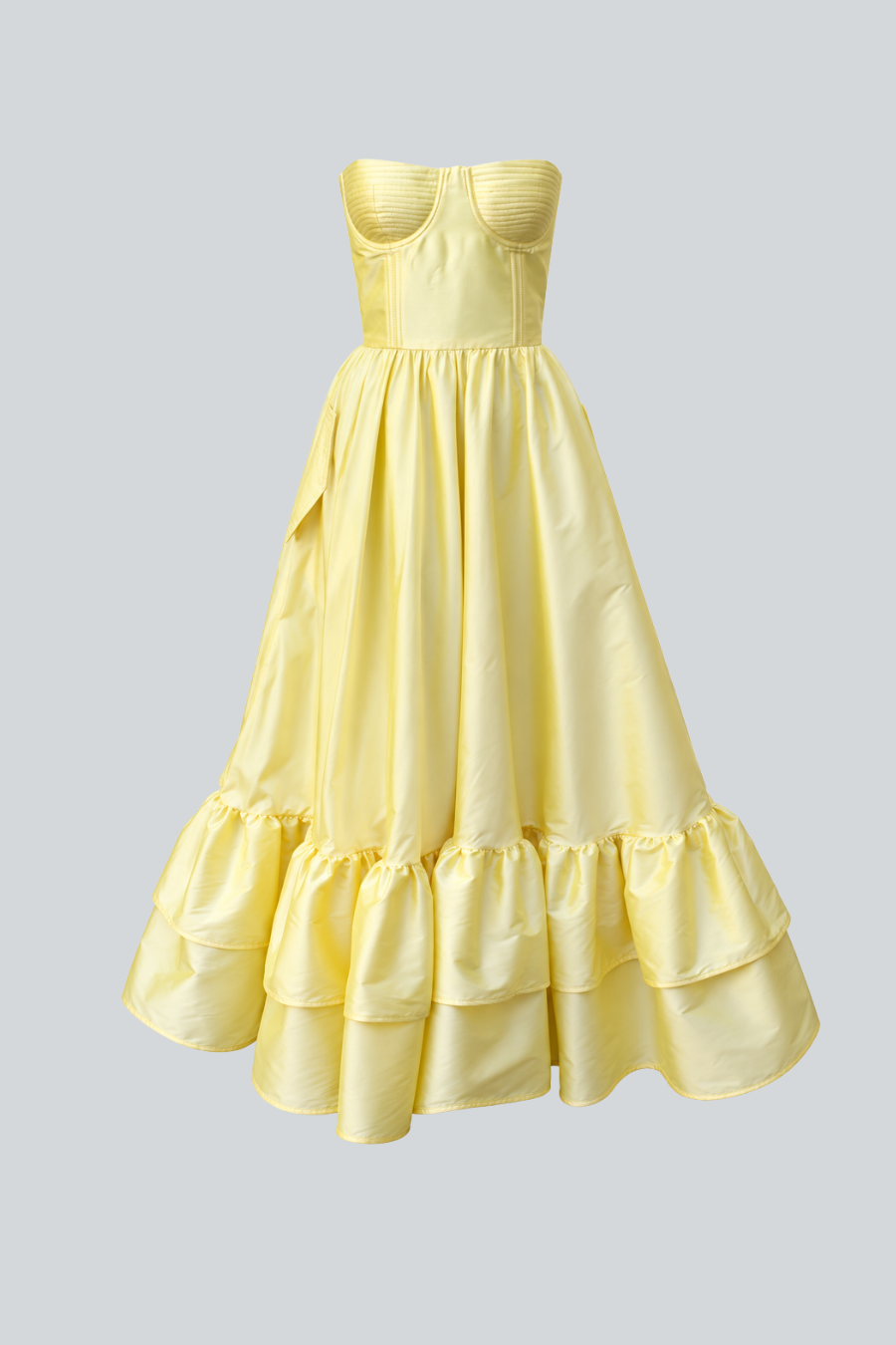 Vestido Luciana de Jeanette Toscano midi strapless en color butter yellow con olanes